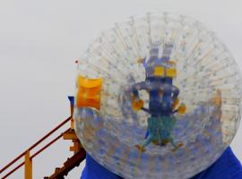 Stag group having fun with Zorbing